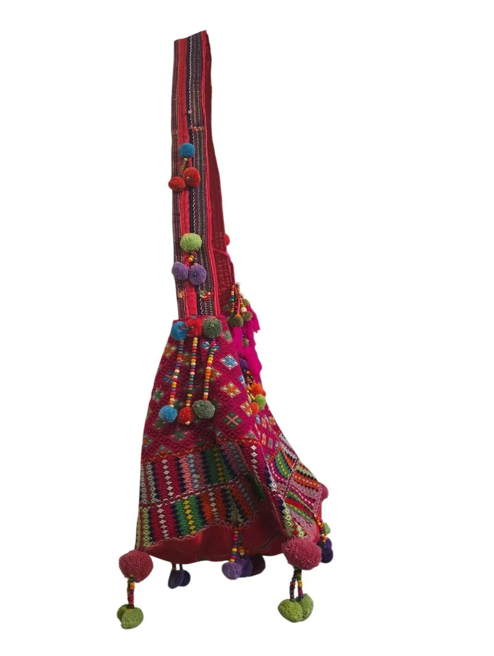 Colorful, handcrafted bohemian shoulder bag with traditional woven details